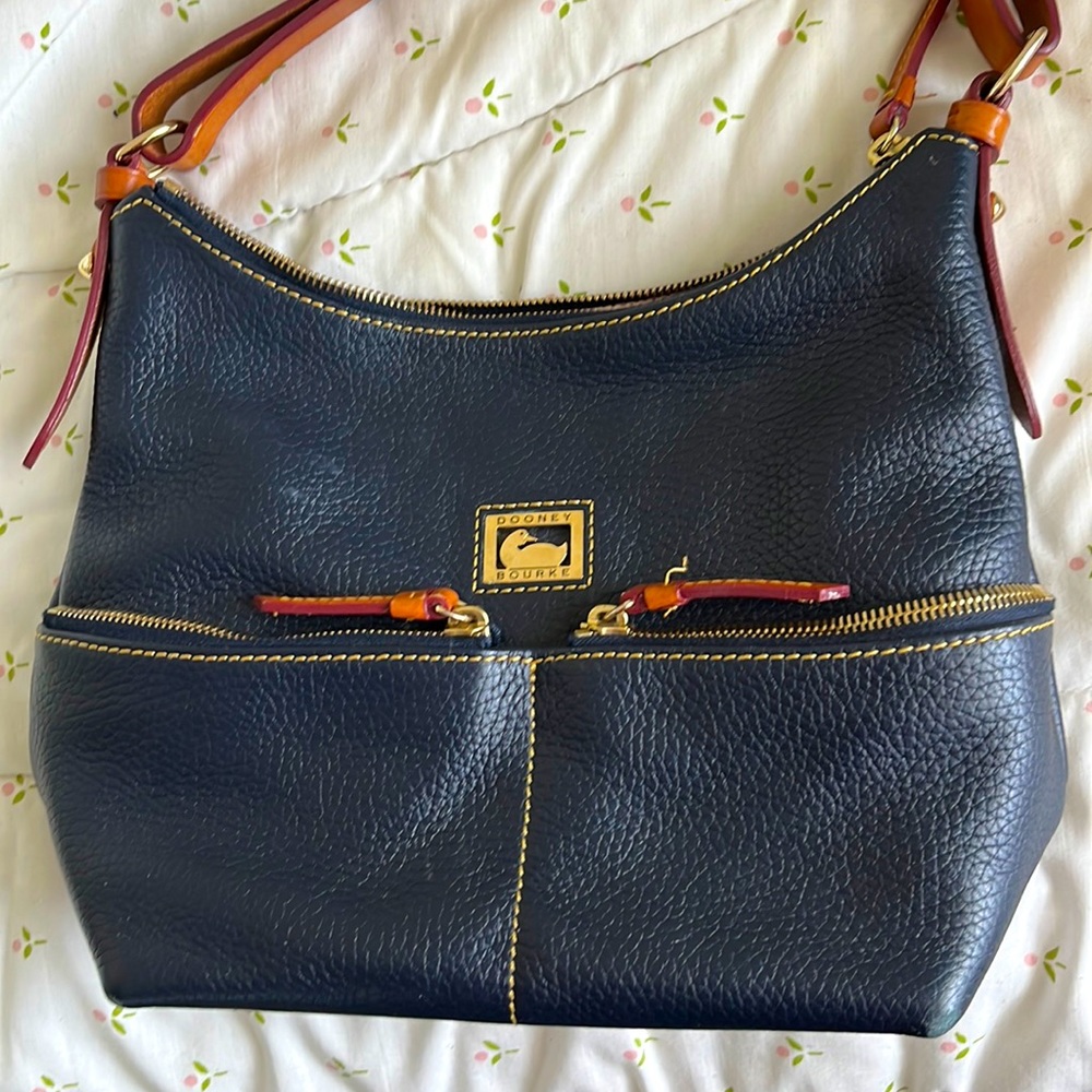 Dooney & Bourke all-weather pebble leather handbag.  Navy with brown trim